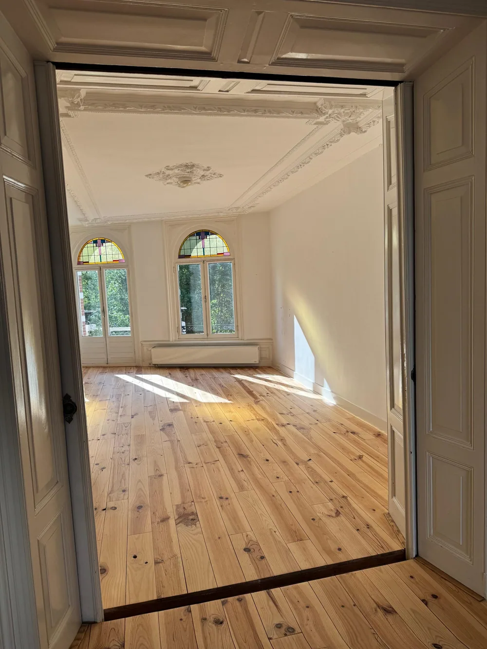 Een door Vloer Schuur Expert gerenoveerde houten vloer, voorbeeld 3